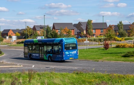 A blue bus on the estate.