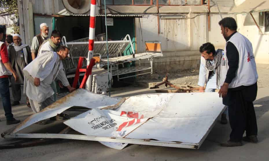 Doctors of MSF and citizens move the debris of the hospital in Kunduz damaged by the US airstrike on Thursday.