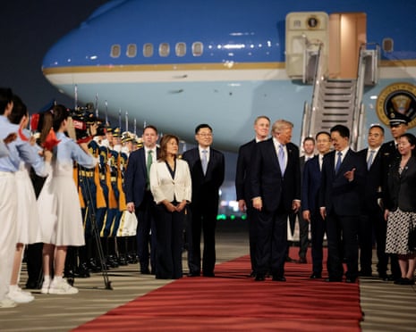 Donald Trump stands with Chinese vice-president Han Zheng during an arrival ceremony at Beijing Capital International Airport, 13 May 2026.