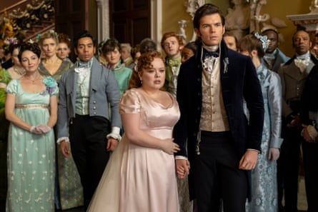 Shot from the TV series Bridgerton, showing Nicola Coughlan as Penelope Featherington and Luke Newton as Colin Bridgerton