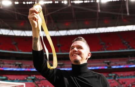 Marc Skinner proudly shows off his FA Cup winners’ medal at Wembley. He gave it to his elder daughter.