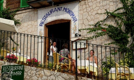 Diners sit outside Restaurant Montimar, in Montimar, Estellencs, Mallorca