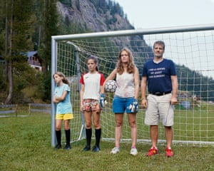 a family standing in a football goal