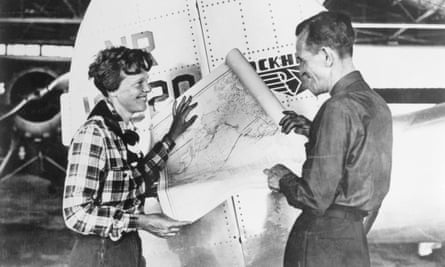 The pilot Amelia Earhart and her navigator, Fred Noonan, with a map of the Pacific that shows the route of their last flight in 1937. The quest to find her plane has led to attempts to map the seabed.
