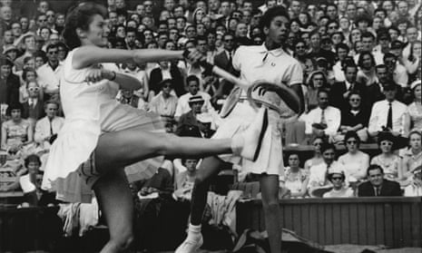 Angela Buxton, left, and Althea Gibson playing on centre court at Wimbledon in 1956.
