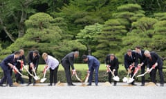 G7 leaders plant trees at Ise Jingu shrine in Kashikojima, Japan.