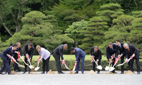 G7 leaders plant trees at Ise Jingu shrine in Kashikojima, Japan. 