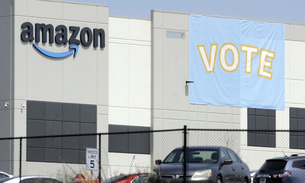 A banner encouraging workers to vote in labor balloting is shown at an Amazon warehouse in Bessemer, Alabama.