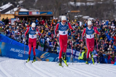 Martin Løwstrøm Nyenget, Johannes Høsflot Klæbo and Emil Iversen ski side by side.