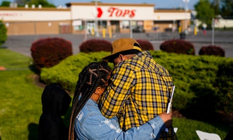 Mourners at the scene of a mass shooting in Buffalo, New York, 19 May 2022