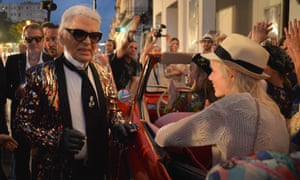 Karl Lagerfeld greets models at the Chanel at the Prado promenade event in Havana.
