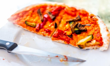 Homemade pizza with peppers, mushrooms and courgette