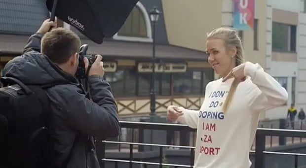 Nadezhda Sergeeva points at the anti-doping shirt while filming the video