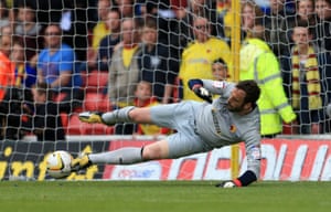 Manuel Almunia of Watford saves a penalty taken by Anthony Knockaert of Leicester City