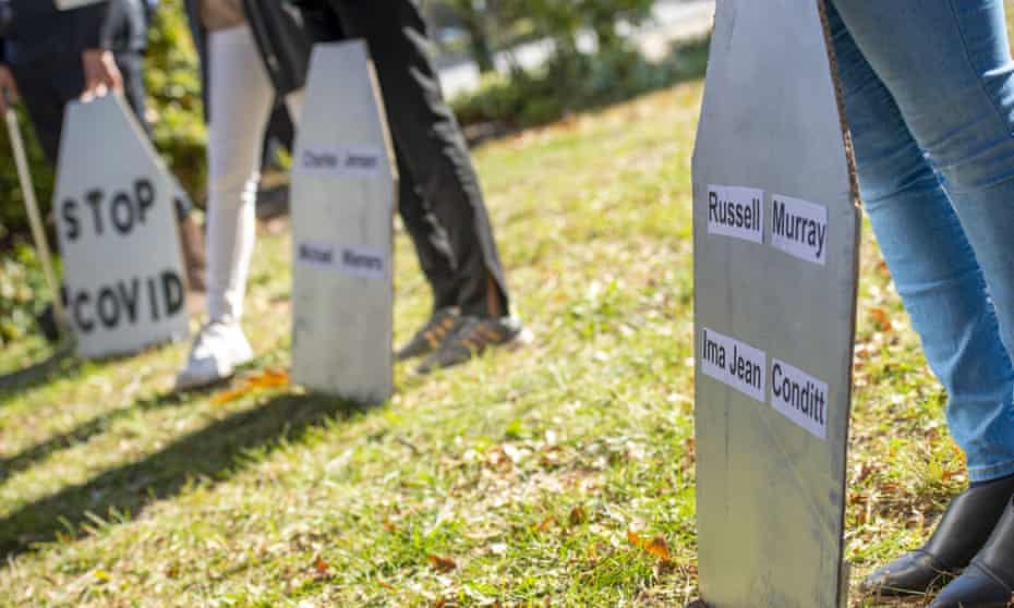 Activists, many of who brought ashes of relatives who died from Covid, gather outside the US Capitol to call for action to prevent future pandemics.