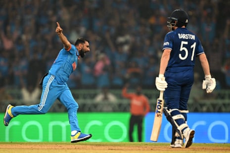 India's Mohammed Shami celebrates after taking the wicket of England's Jonny Bairstow.