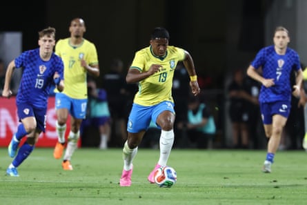 Brazil’s Endrick surges forward with the ball against Croatia