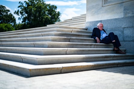 Bernie Sanders sits in the shade, Washington