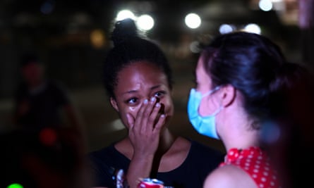 Kenosha marches on as protesters describe 'kidnap' by federal agents | Wisconsin 4 Adelana Akindes cries after she was released from jail in the wake of the shooting of Jacob Blake by police officers, in Kenosha, Wisconsin.