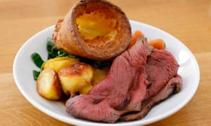 Traditional British Sunday lunch of roast beef and Yorkshire pudding.