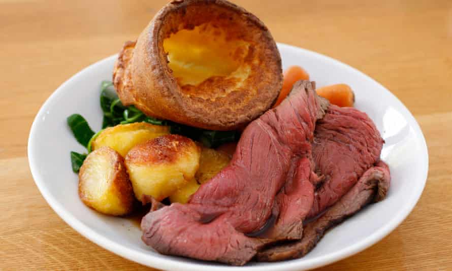 Traditional British Sunday lunch of roast beef and Yorkshire pudding.