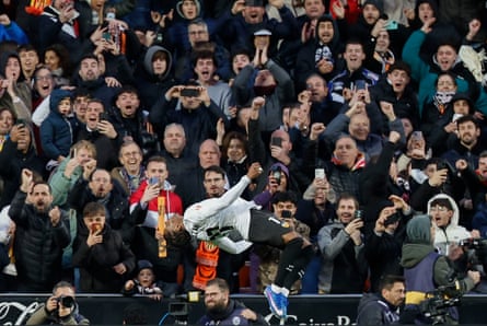 Largie Ramazani celebrates with a back flip