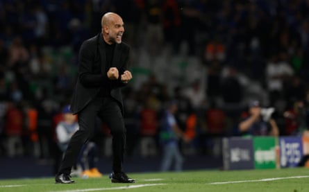 Pep Guardiola urges on Manchester City on the touchline