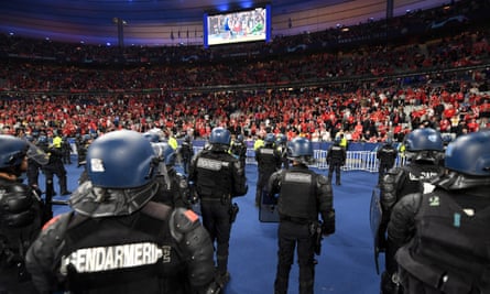 ‘Be extremely cautious’: expert fears for European finals after night of violence | Uefa 1 Police at the 2022 Champions League final between Liverpool and Real Madrid