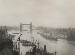 The Pool of London, 1927. This evocative shot shows the port in its heyday. In the centre, two Lightermen manoeuvre their barge with sweeps in the traditional way