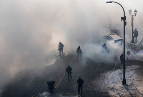 Scene of a shooting involving federal immigration agents in MinneapolisFederal agent amid tear gas during scuffles with community members at the scene of a shooting involving federal immigration agents in Minneapolis, Minnesota.