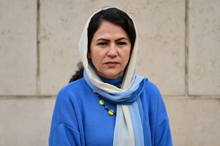 Fawzia Koofi wearing a headscarf looks directly at the camera.