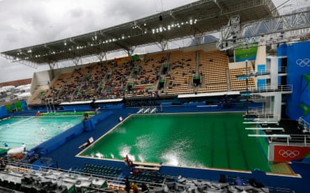 The water in the diving competition pool is green before the start of the Men’s Synchronised 3m Springboard final.