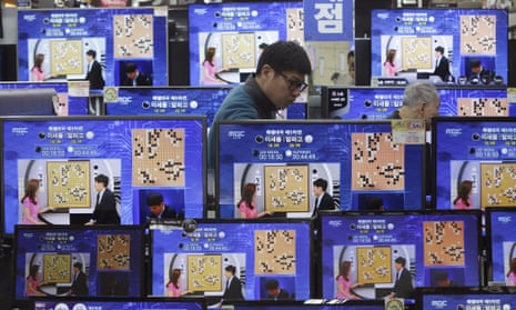 TV screens show live broadcast of Google DeepMind’s Go match against world champion Lee Sedol
