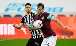 Federico Fernández (left) holds up Christ Wood (right).