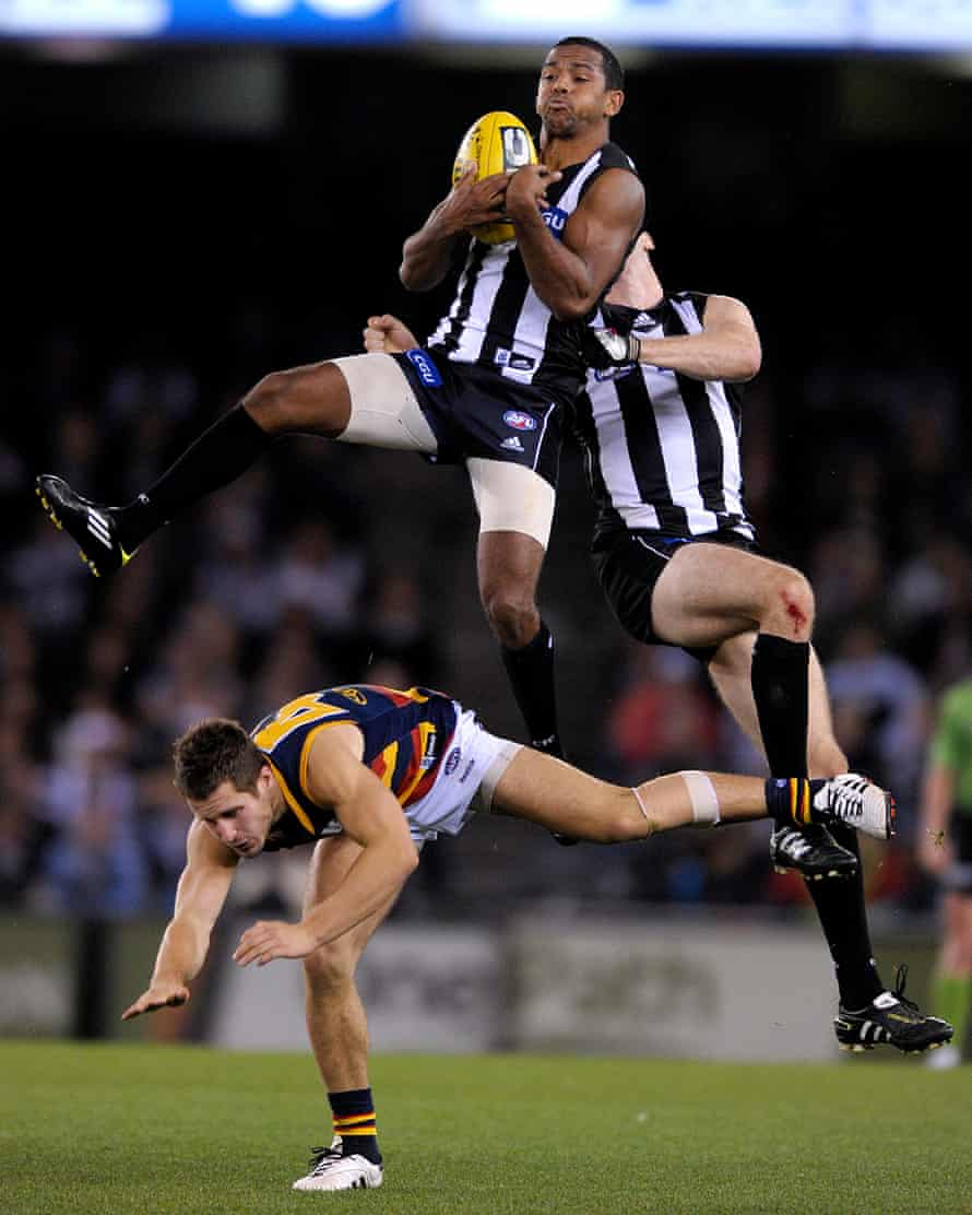 Davis takes a mark for Collingwood in a 2011 game against the Adelaide Crows at Etihad Stadium