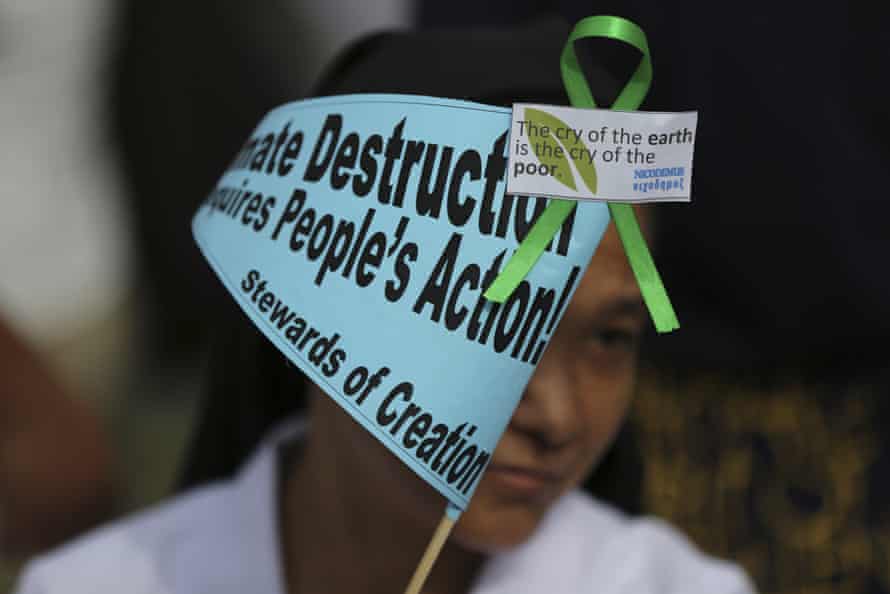 A Filipino nun joins the Climate Solidarity prayer march in Manila, Philippines, November 2015.