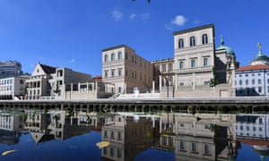 The future art museum Museum Barberini is reflected with other buildings in the Alte Fahrt in Potsdam, Germany.