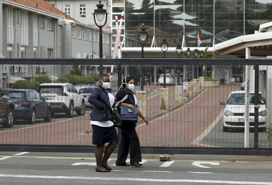 Medical staff walk outside the St Augustines Hospital in Durban last Friday. More than 60 people at the hospital have tested positive for Covid-19