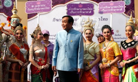 The Thai prime minister, Prayut Chan-ocha (centre), pro-junta leader of the Phalang Pracharat party, which claims it won the popular vote. 