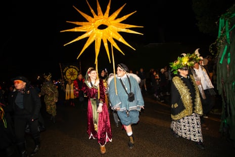 Charlotte and Linus carrying the midwinter sun to the ‘burning of the sun’ parade at Princess May Recreation Ground.