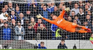 Darlow dives at the shot from Rudiger.
