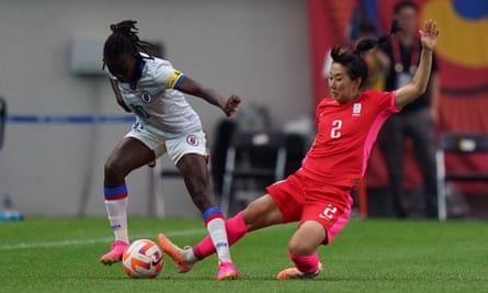 Choo Hyo-joo makes a sliding tackle to win the ball from Nerilia Mondesir of Haiti during a recent friendly at the Seoul World Cup Stadium in Seoul, South Korea, 08 July 2023.