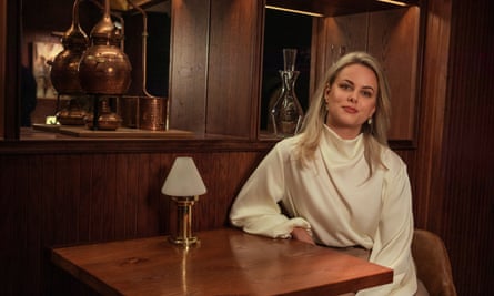 Cecilie Fjellhøy sitting at a small table