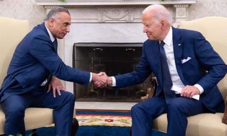 Biden and Khadimi at the White House on Monday. ‘We’re not going to be, by the end of the year, in a combat mission,’ Biden said.