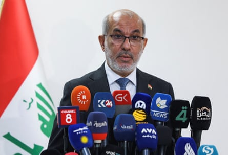 Iraq’s oil minister, Basim Mohammed Khudair, speaks at a press conference in Baghdad