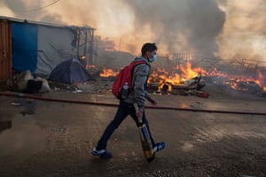 A man in a the Calais camp
