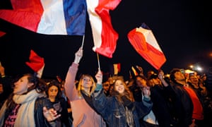 Supporters of Macron celebrating in Paris on Sunday night