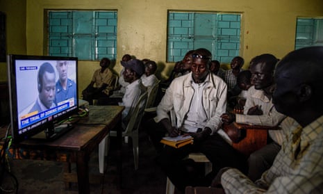 People in Lukodi, Uganda watch the screening of the ICC trial of Dominic Ongwen.