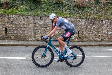 Dutch rider Oscar Riesebeek cycling up a hill during Paris-Nice 2025