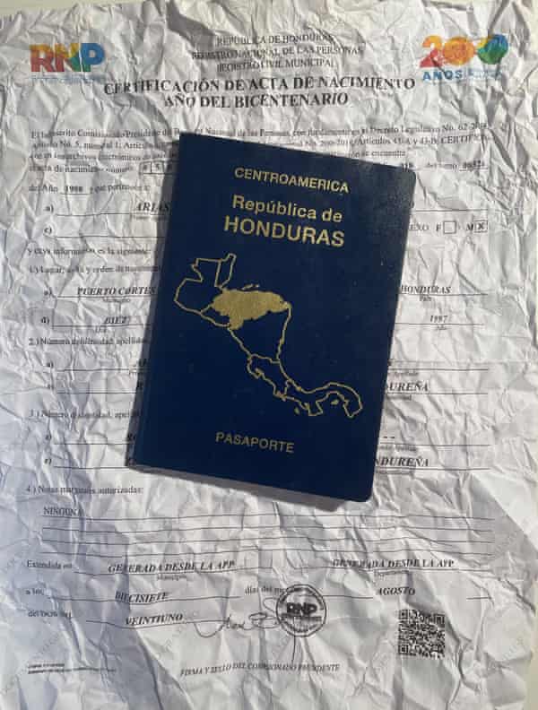 A Honduran passport and birth certificate found in the desert on the US side of the border barrier with Mexico.